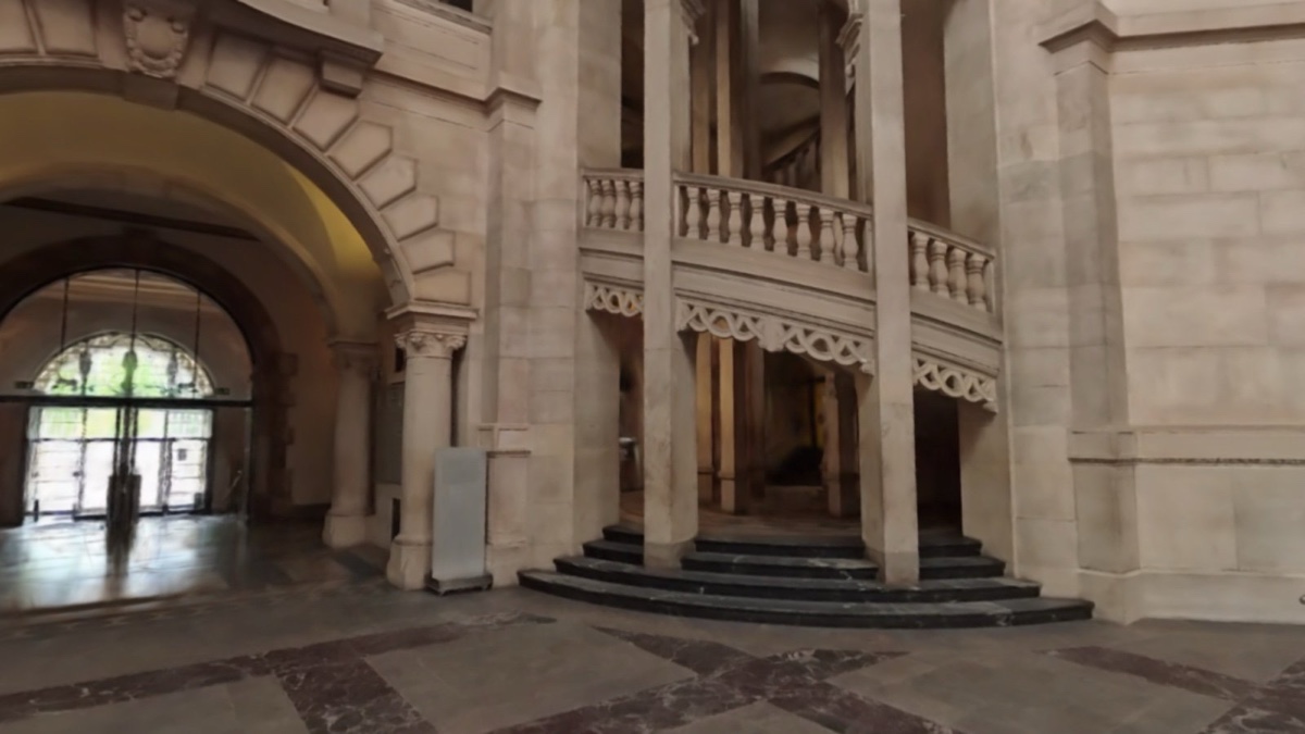 Camera 2, right staircase — captured plain daylight, no dressing