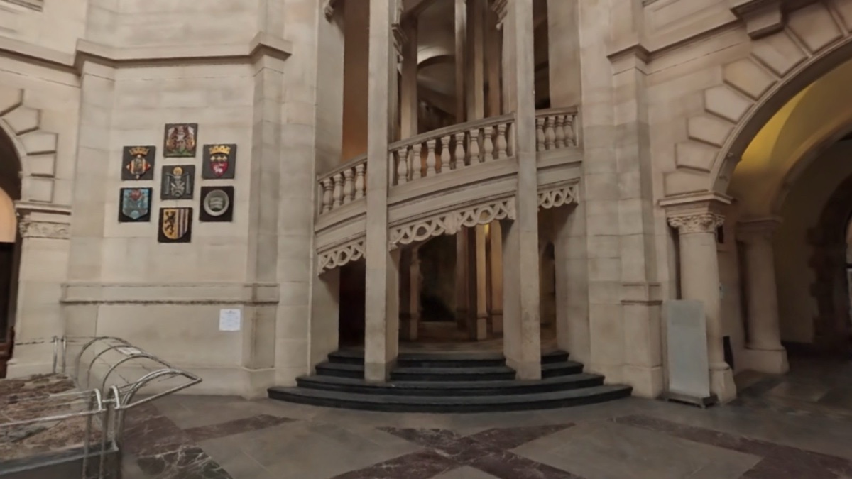 Camera 3, left staircase — captured plain daylight, no dressing